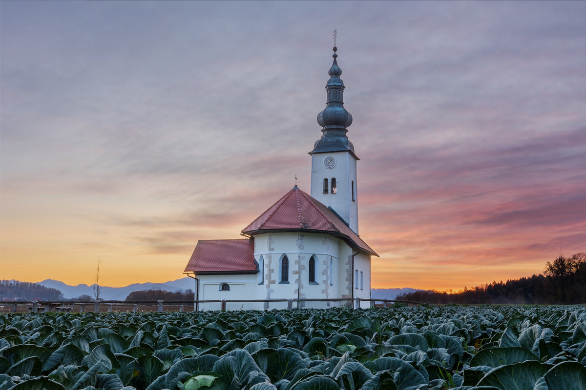 Church in magnificent sunset Poster och Canvastavla