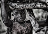Somba tribe child carrying some wood - Benin Poster och Canvastavla