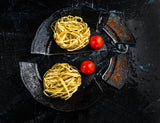 Italian pasta on a broken plate Poster och Canvastavla
