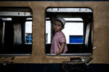 Boy alone in a train carriage - Bangladesh Poster och Canvastavla