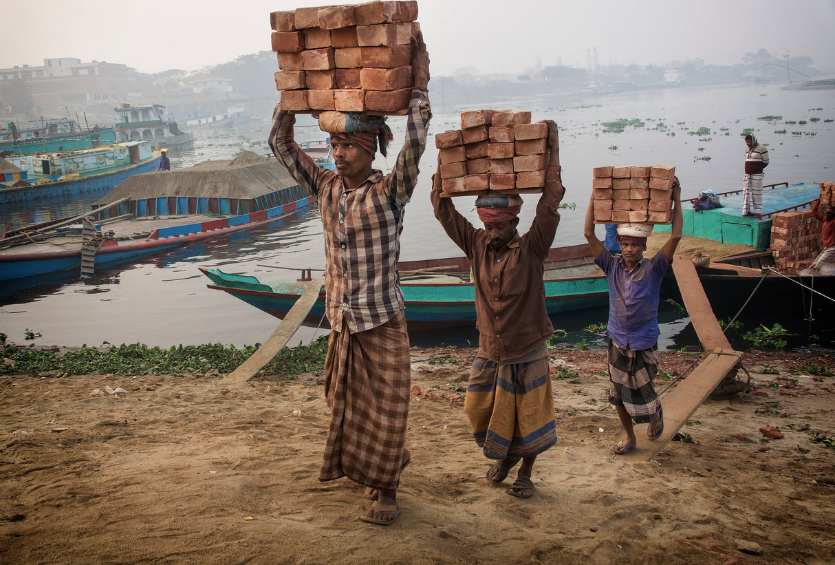 transporting bricks at Biruganga riverbank Poster och Canvastavla