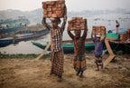 transporting bricks at Biruganga riverbank Poster och Canvastavla