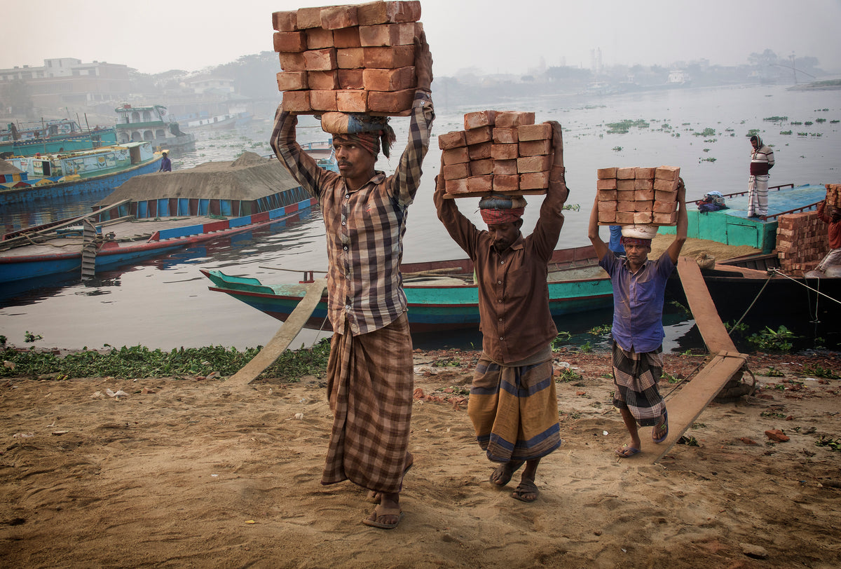 transporting bricks at Biruganga riverbank Poster och Canvastavla