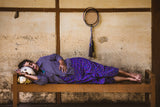 Resting woman and her doll Poster och Canvastavla
