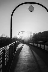 Man in backlight on a bridge Poster och Canvastavla