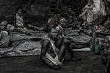 South Sudanian people having a rest near a market. Poster och Canvastavla