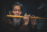 Playing Flute in northern Vietnam Poster och Canvastavla