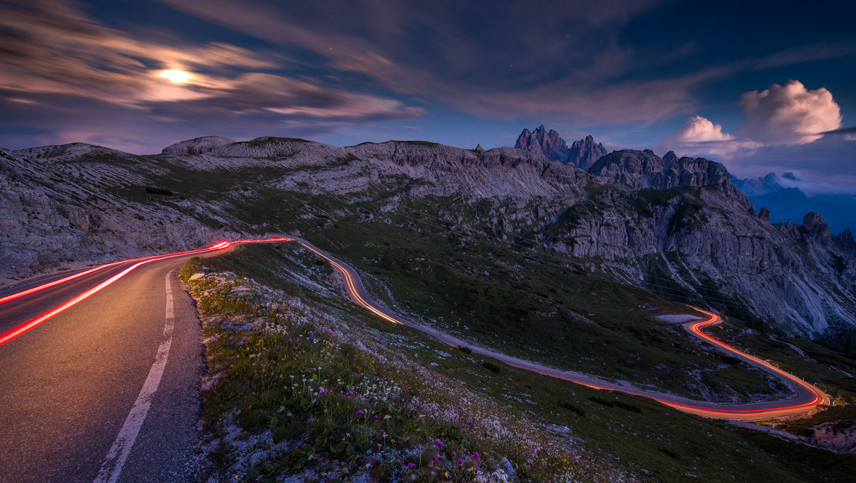 Light tracks on a pass road in the Dolomites Poster och Canvastavla