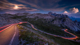 Light tracks on a pass road in the Dolomites Poster och Canvastavla