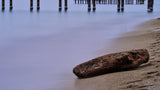 old pier on the beach and long exposure sea waves Poster och Canvastavla