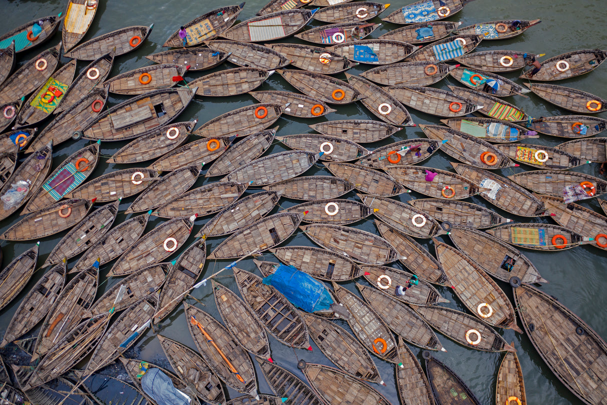 Boats laid out like petals with life saving rings Poster och Canvastavla
