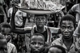 Selling in a market in Benin. Poster och Canvastavla