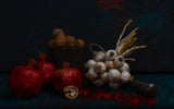 Still life with garlic, walnuts and pomegranates Poster och Canvastavla
