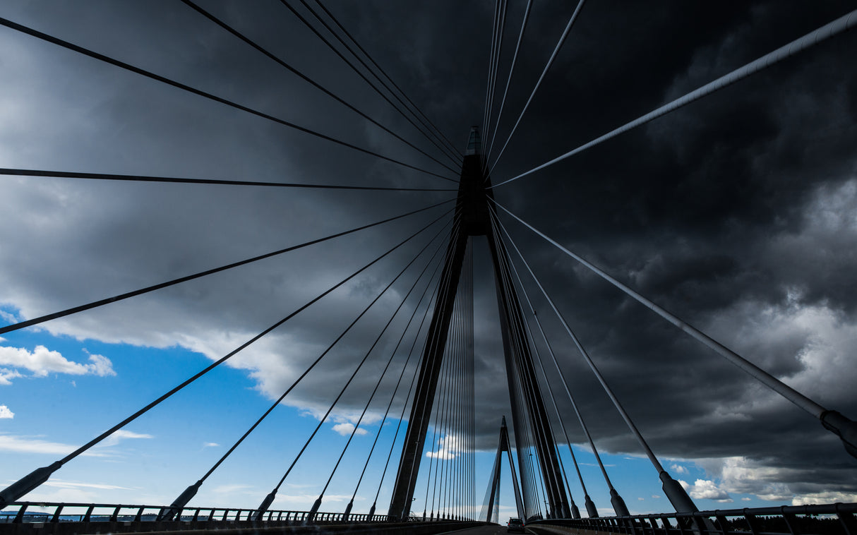 Bridge under troubled skies Poster och Canvastavla
