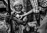 Helping a blind person in the streets of Bangladesh. Poster och Canvastavla