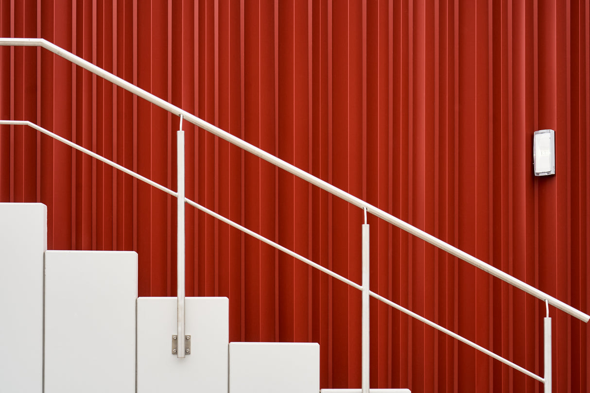 railing in front of red Poster och Canvastavla
