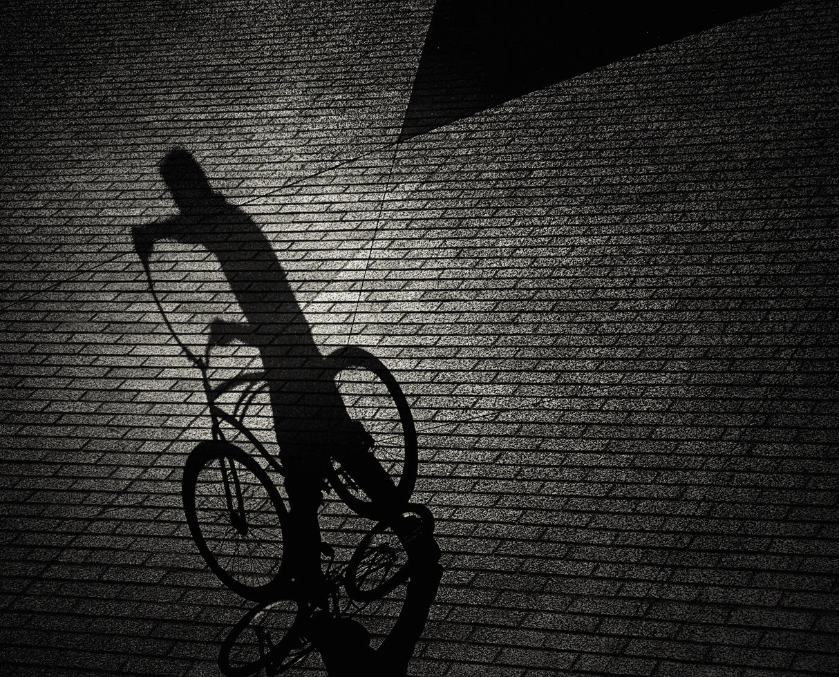 Man and bicycle shadows Poster och Canvastavla