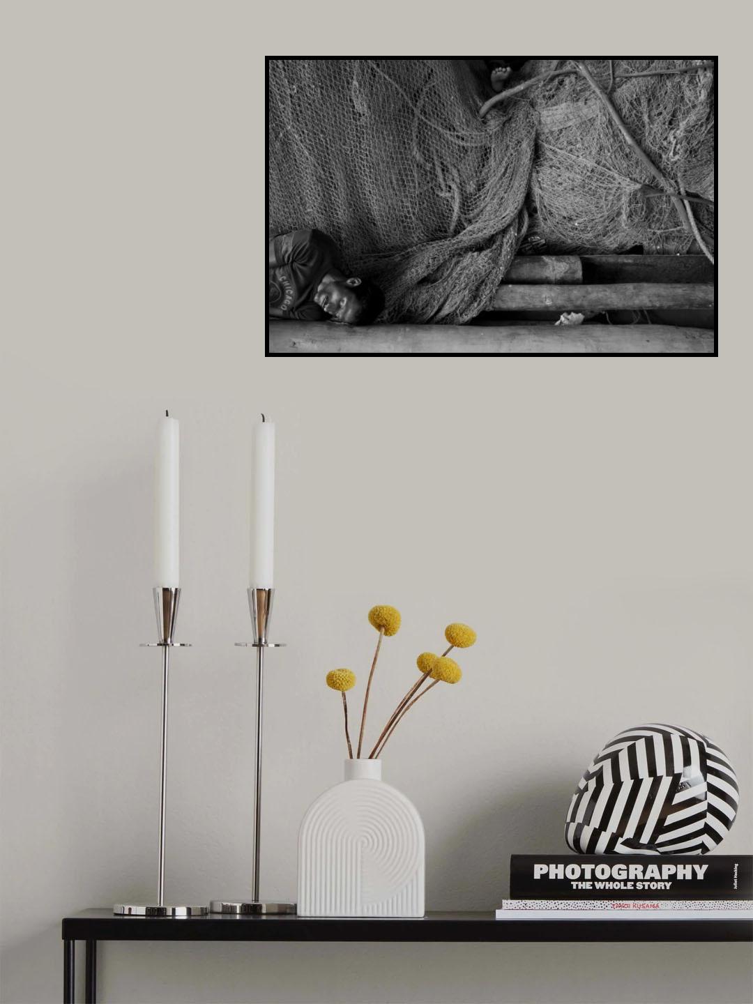 Midday nap of a fisherman at the fish dock Poster och Canvastavla