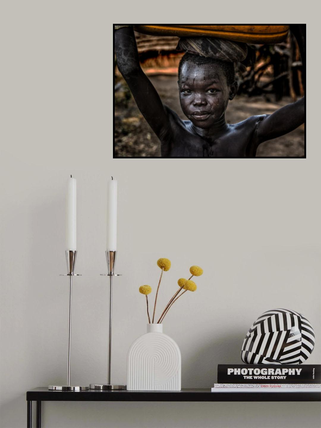 South sudanian child carrying a water containera Poster och Canvastavla