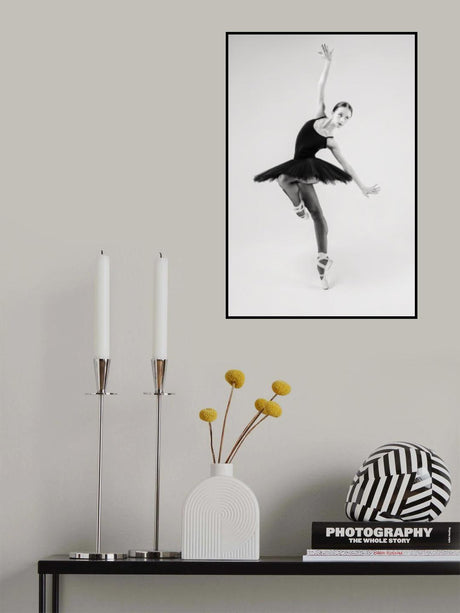 black swan. ballerina in a black tutu shows elements of ballet dance in motion Poster och Canvastavla