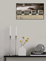 Seashore serenity after a sand battle Poster och Canvastavla