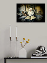 The old woman is reading the Koran. Poster och Canvastavla
