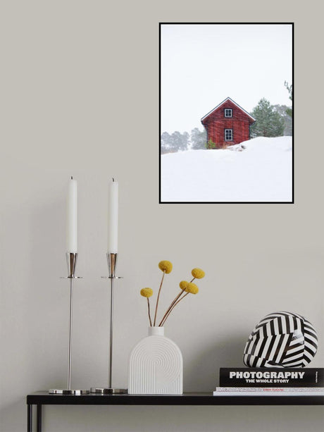 Old red house during snowstorm Poster och Canvastavla