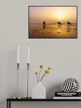 Sunset silhouette of horses and riders, beach of Essaouira Poster och Canvastavla
