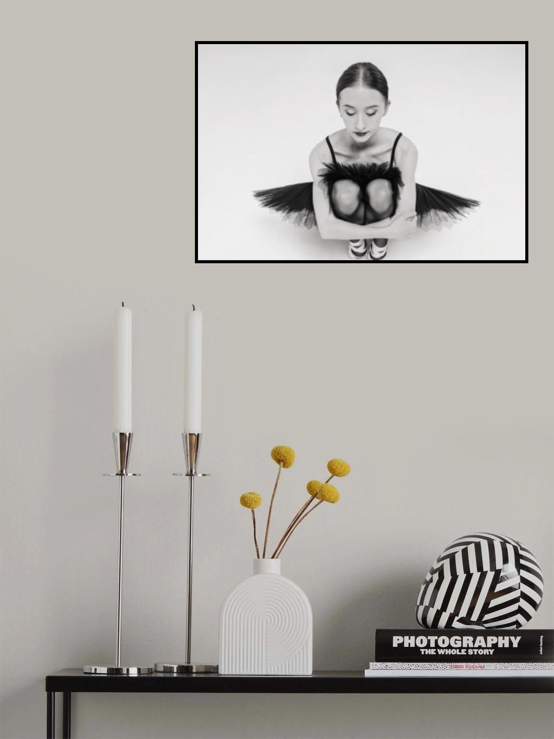 a portrait of a ballerina in a black tutu squatting hugging her knees Poster och Canvastavla