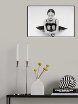 a portrait of a ballerina in a black tutu squatting hugging her knees Poster och Canvastavla