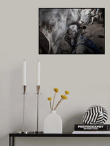 The cow accepts that the mundari child drinks the milk from its udders. Poster och Canvastavla
