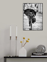 Pedaling in the rain Poster och Canvastavla