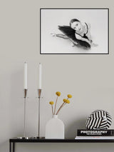 portrait of a ballerina in a black tutu lying on the floor leaning on her hands top view Poster och Canvastavla
