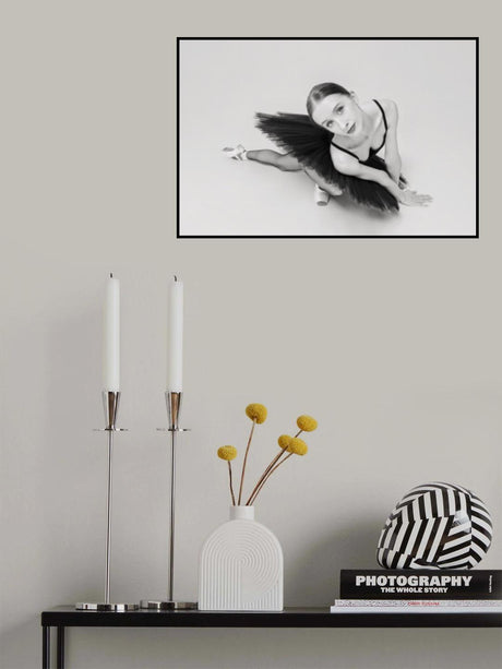 portrait of a ballerina in a black tutu lying on the floor leaning on her hands top view Poster och Canvastavla