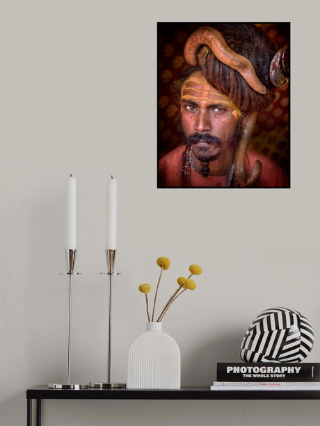 Young sadhu with a snake in his head of hair Poster och Canvastavla