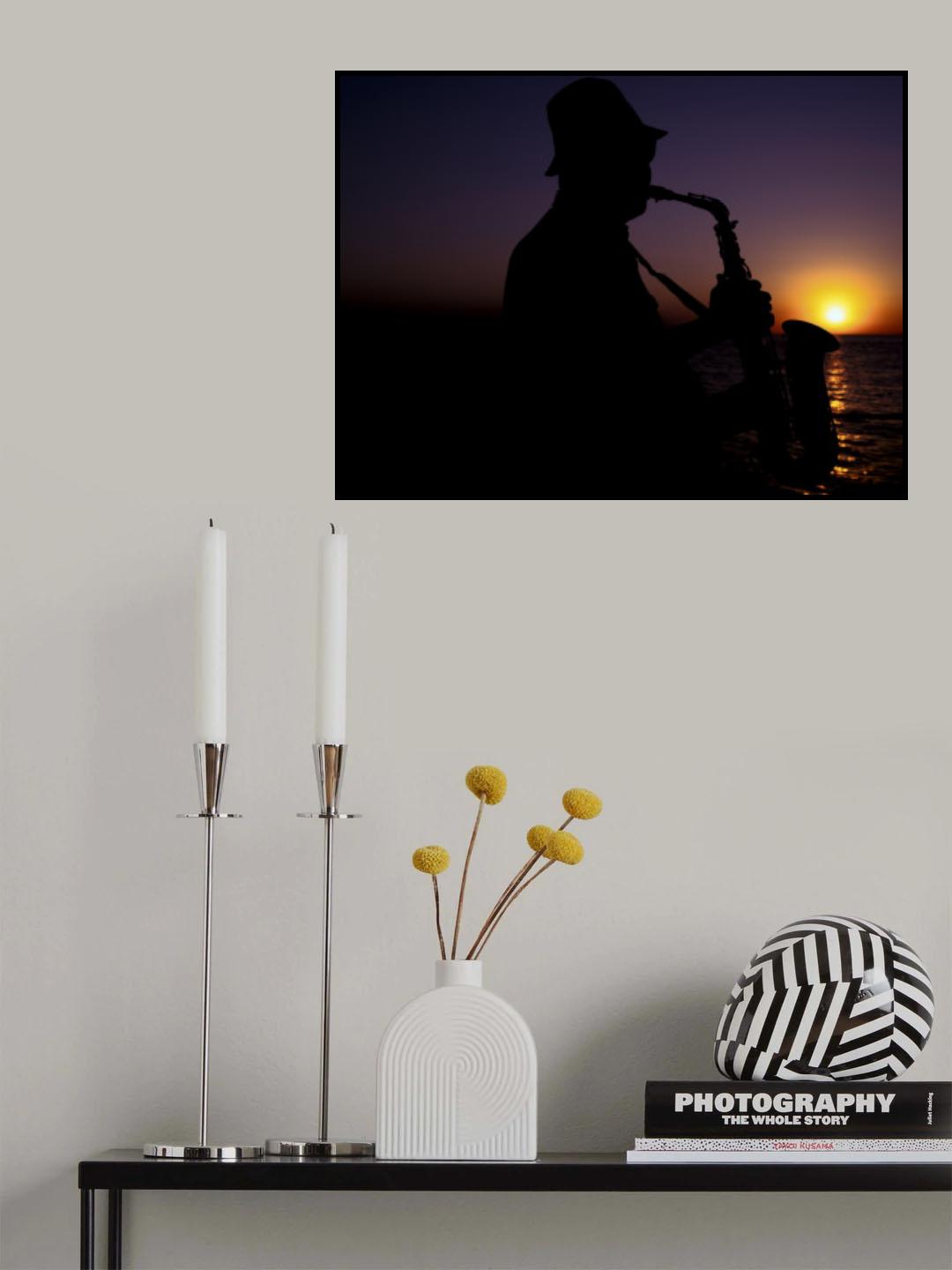 a musician playing the saxophone at sunset Poster och Canvastavla