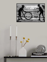 Africa kids playing with old wheel Poster och Canvastavla