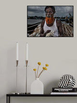 A man from Bangladesh untangling nets. Poster och Canvastavla